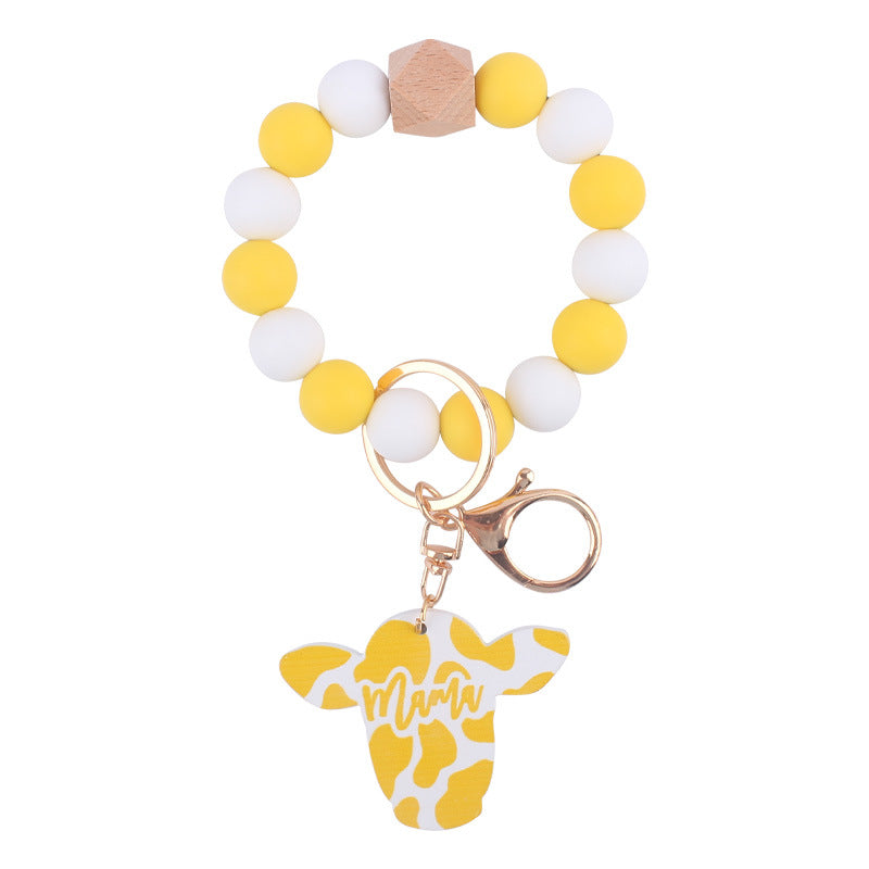 Wholesale Silicone Beads Cartoon Western Style Bull Head Wooden Sign Pendant Bracelet Keychains